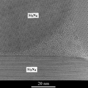 An amorphous phase trapped at a triple junction between Si3N4 grains (within a silicon nitride particulate-reinforced silicon carbide composite)